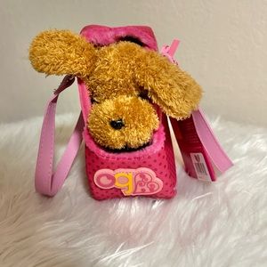 This is a cute toy dog in purse.